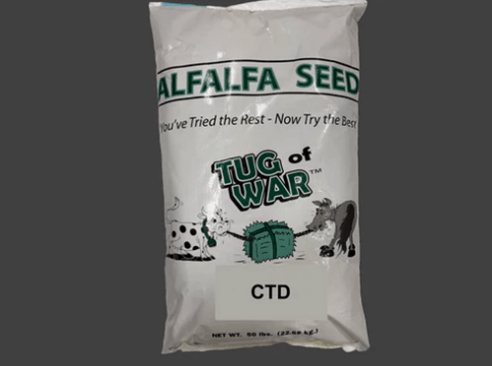 Bag of alfalfa seed branded "Tug of War," showcasing playful cartoon graphics of animals