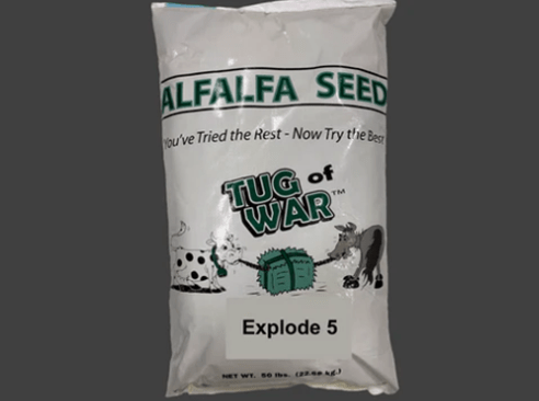 Alfalfa seed bag labeled "Tug of War" with a tagline promoting its quality