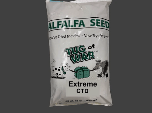Alfalfa seed bag labeled "Tug of War Dy-Hard CTD," highlighting quality seed for livestock feed